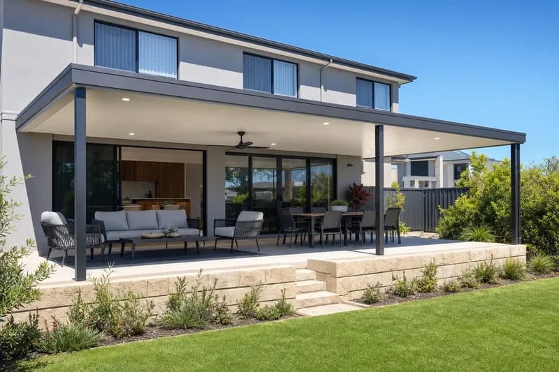 Insulated patio with a white panel ceiling, downlights and a ceiling fan